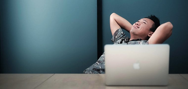 happy man at laptop